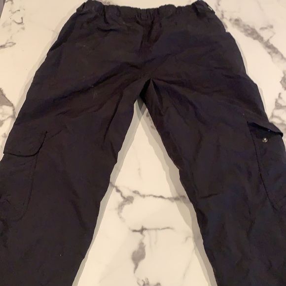These are black cargo pants from ninth hall. size small, comfortable ,100% nylon - Picture 3 of 5